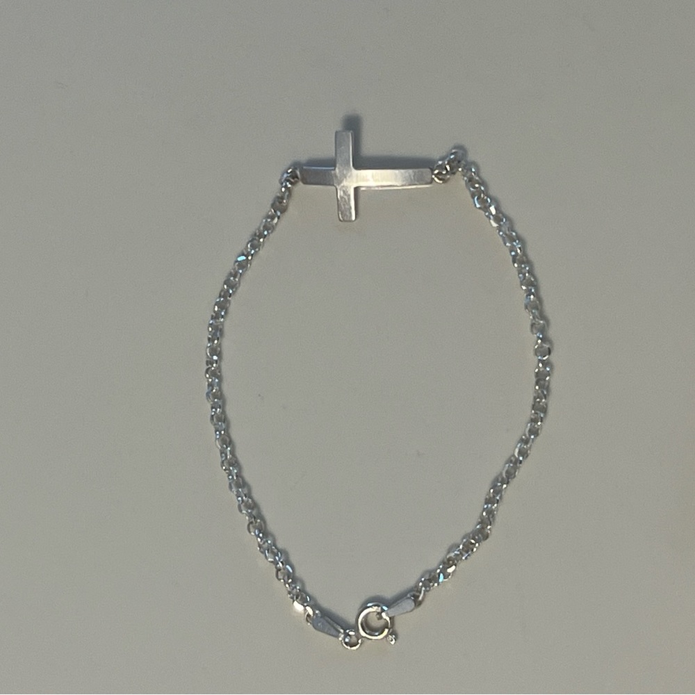Sterling silver cross chain bracelet.